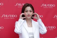 Kang Mina aka Kang Mi-Na of girl group I.O.I attends the photocall for SHISEIDO "Shiseido Red Cycle Lab" pop-up store open event on March 16, 2023 in Seoul, South Korea | Image via: Getty
